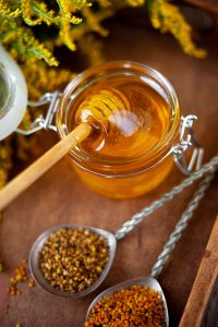 Honey in a jar. Bee pollen. Beekeeping product. Food on the table. Still life of flowers SSUCv3H4sIAAAAAAAACpxWyW7kNhC9B5h/MHieBrhIXPIrRg6URHczlkRFpNwxDP97SmuT1IxnkFuz6qmK77GW/vj2x9MTqrS3Nfrz6WM+wdm27eTDqIN1PZjx980+mr4xY2x5GxnHsUHb+GQaG9xodRsbKx3qW687A0Y0uNb0aPZ8Ln7kgw6TNz66jr9NIZjRB1e/gpntgQhl4wsYyJG8cZU5wRozOG/DcHPB+Rg+uL4pk+9b3b0nn45Gdz7Y5a4HrLLXJckSMYYbP8THWvcpLqJZ62CuIE1CdH+H5/X8tDu2aGEWDG3RV2WmarHtpjX4//py/fHXIcXV9PWsxcdndOvRtEavj/O8QtHrHZ6mi1kMLsQcEMesZCiLf3O9ea9dV/kUSzHGOdZPw9CazvRZXE7YKW7l7m2WXVCRo+763wREICulOWpo4ZFOwXgOe2ndfemKmIYQKse92aA726eJqcAS/1ScX2tzd66BBkpxjJIfhkxgglB8EubdtMAmC0fkmTOkzZQhZ2WguefuTqNJdlKmMpnMtOTlqQruxuSFVbBzztFBWpuWFRGYKlacXvhvnb3bDDslHtwyBtMyON1vhJGZdi+SUqhTzqB9XlWEF2dNdP16Hd3UZzpzfH611v4z2QxHIfeOizpYT411UbO+uVq3PhtO2g56hMG3tP9qGkZb2/4aWVy4LVW/R6rhrmGcawxR6KXjbs4Numpnxi+QyRwFqb3f2C32eDaCkq6LUvUuLDNnG2GoWfsSQf8LToApLaESJBUMxUvkZiHOcqP9jtPQOt2YOekxIPP1QkrFC1EKsc/xeNNsPlk+fMnS2QAKiwfgtH92jHpgjlW0+cp92URb6Ue+dEFtAMkfgHxXrRgYyfSBWdfW7imir/MNtmNKvkL2fTOvk86Cir+hLBeEf6kel6r4JQHF1U8IqORxIu0EK+HqX5KTrMAF3clFJbkAbfPFvxJEhFSYSiLIUfsJOcS4whLmpDr8OTfEYF5wKQQ/ICs1RLhSFN62fMTemCFsdK25MhctFb8UJdEXyXBzqY2uCoKlNqo5vso5I8mkUoStU2oju4wS9EIwk8wUF01Ecylk3UCGUl4KxbnQksOamUfl538AAAD//wMA2/KQQEMKAAA=